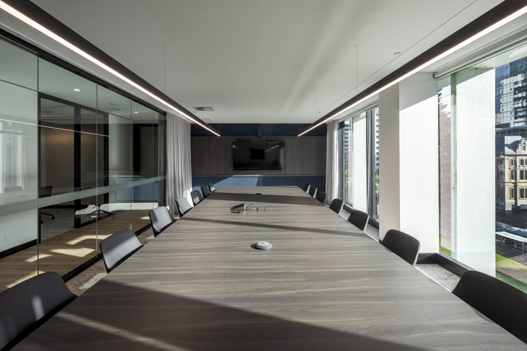 Stylish office fit out board room with large windows and lots of natural light