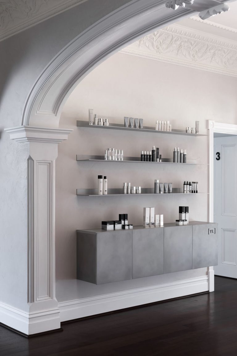 cosmetic clinic interior design with shelving for products.